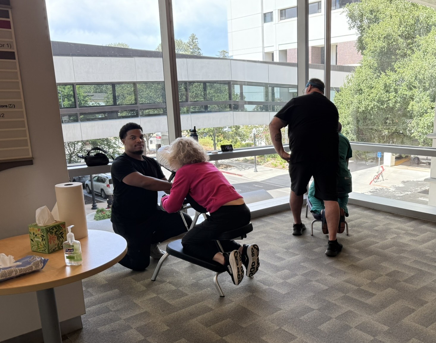 Chair massage team treating event attendees at a Sacramento venue