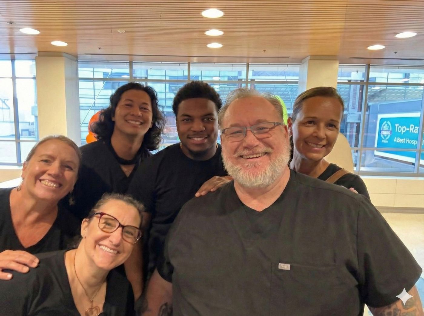Living True mobile chair massage team with Julie at a Sacramento healthcare facility